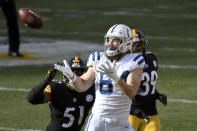 Indianapolis Colts tight end Jack Doyle (84) makes a catch in front of Pittsburgh Steelers inside linebacker Avery Williamson (51) and free safety Minkah Fitzpatrick (39) during the first half of an NFL football game, Sunday, Dec. 27, 2020, in Pittsburgh. (AP Photo/Don Wright)