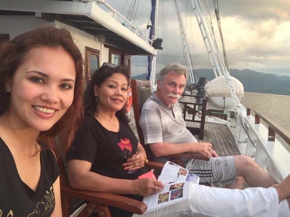 Pictured is retired British geologist Jim Fitton with his wife Sarijah Fitton and his daughter Leila Fitton.