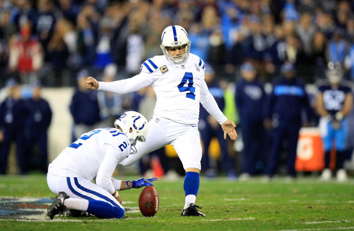 Adam Vinatieri kicks a field goal.