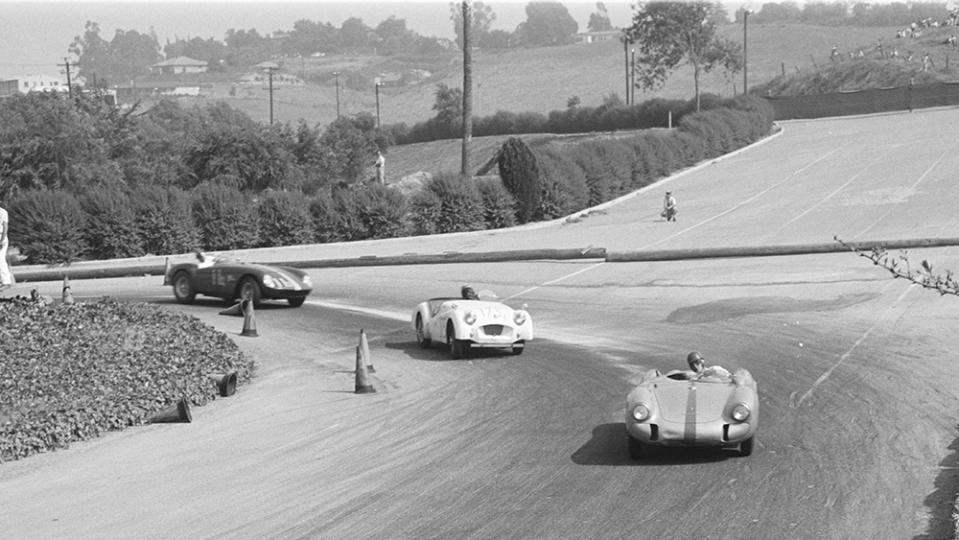 UNITED STATES - JUNE 25: 1956 Los Angeles County Fair Grounds Pomona Road Race - June. Ken Miles' Porsche 550, Dick Seagle's Triumph TR2 (#137), and John Von Neumann's Ferrari 500 Modial (#11). (Photo by Bob D'Olivo/The Enthusiast Network via Getty Images/Getty Images)