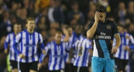 Football - Sheffield Wednesday v Arsenal - Capital One Cup Fourth Round - Hillsborough - 27/10/15 Arsenal's Olivier Giroud looks dejected after Sheffield Wednesday's third goal Action Images via Reuters / Jason Cairnduff