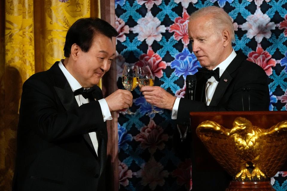 President Joe Biden toasts with South Korea's President Yoon Suk Yeol during a State Dinner in the East Room of the White House in Washington on Wednesday.