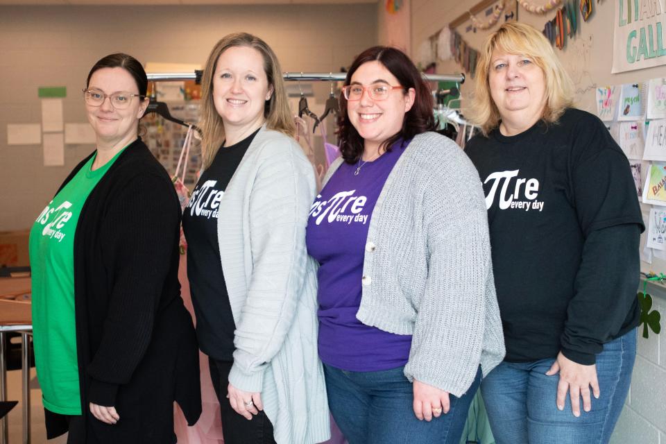 Educators Jessica Ody, from left, Nicole Bourque, Talia Borochaner and Karen Sibley pose for a portrait in front of donated prom gowns at Bensalem High School on Tuesday, March 14, 2023. The school has put together a closet of prom gown donations for students to choose from for their upcoming senior prom on April 21.