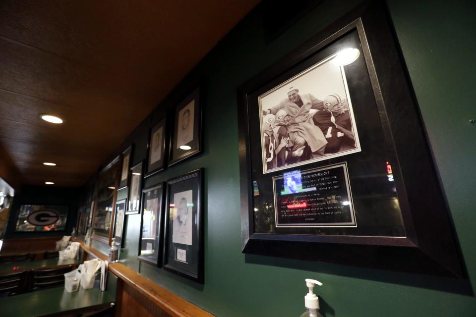 Emmett's Bar and Grill has a vintage Green Bay Packers wall donning a variety of photos, drawings and displays. The wall is pictured Wednesday, October 4, 2023, in Appleton, Wis.