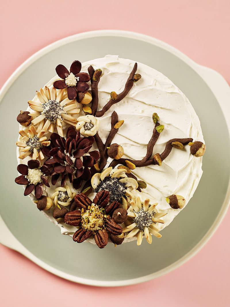 A top view of Gardner's veggie cake, decorated with nuts. (Photo: Heath Robbins)