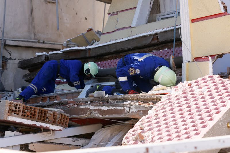 Ukrainian rescuers search for people under the rubble Hatay, Turkey,