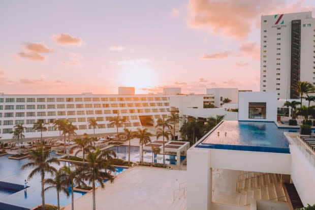 <p>Hyatt Ziva Cancun</p><p>Girlfriends looking for a sunny escape should head to Cancun. Make your weekend home base at the <a href="https://go.skimresources.com?id=113896X1572730&xs=1&url=https%3A%2F%2Fwww.tripadvisor.com%2FHotel_Review-g150807-d152887-Reviews-Hyatt_Ziva_Cancun-Cancun_Yucatan_Peninsula.html&sref=https%3A%2F%2Fparade.com%2F998988%2Fmarynliles%2Fbest-girlfriend-getaways%2F" rel="noopener" target="_blank" data-ylk="slk:Hyatt Ziva Cancun;elm:context_link;itc:0;sec:content-canvas" class="link ">Hyatt Ziva Cancun</a>, where you and your ladies can enjoy views of the Caribbean from the resort's three infinity pools. Then, for some evening fun, grab a cocktail and test your skills at a salsa dancing class before retiring to your swim-up suite. Your girls will love it!</p>