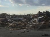 Extensive damage to homes in a neighborhood is pictured in the aftermath of a tornado that touched down in Washington, Illinois November 17, 2013, in this photo courtesy of Anthony Khoury. A fast-moving storm system spawned multiple tornadoes in Illinois and Indiana, threatening some 53 million people across 10 Midwestern states on Sunday, U.S. weather officials said. Washington, Illinois is located 145 miles (233 km) southwest of Chicago. REUTERS/Anthony Khoury/Handout via Reuters (UNITED STATES - Tags: DISASTER ENVIRONMENT) ATTENTION EDITORS - THIS IMAGE HAS BEEN SUPPLIED BY A THIRD PARTY. IT IS DISTRIBUTED, EXACTLY AS RECEIVED BY REUTERS, AS A SERVICE TO CLIENTS. NO SALES. NO ARCHIVES. FOR EDITORIAL USE ONLY. NOT FOR SALE FOR MARKETING OR ADVERTISING CAMPAIGNS. MANDATORY CREDIT