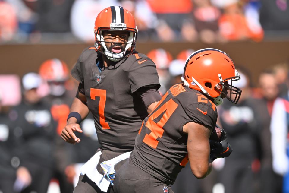 Browns quarterback Jacoby Brissett hands off to running back Nick Chubb against the Los Angeles Chargers during the first half Sunday, Oct. 9, 2022, in Cleveland.