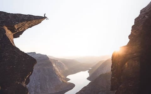 An Instagram post of the Trolltunga outcropping in Norway, which has seen a sharp surge in visitors in the last decade - Credit: Instagram/@lensbible