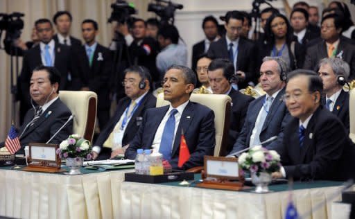 US President Barack Obama (C), Chinese Premier Wen Jiabao (R) and Japanese Prime Minister Yoshihiko Noda (L) attend an East Asian Summit Plenary Session at the Peace Palace in Phnom Penh on November 20, 2012. Obama was on Tuesday set to defy Beijing's protests and use a summit to raise concerns over South China Sea rows that have sent diplomatic and trade shockwaves across the region