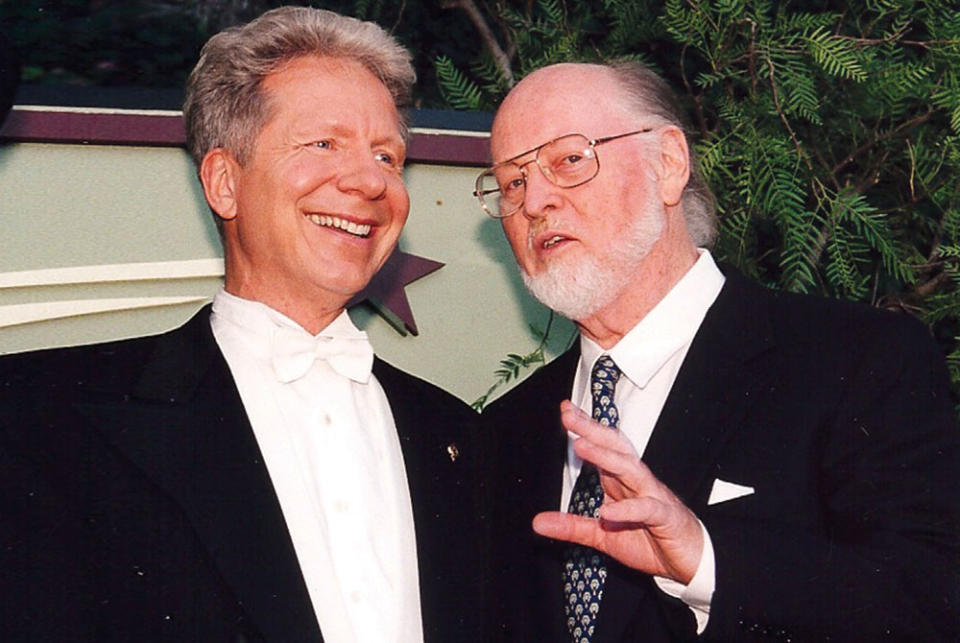 Former Bowl Orchestra conductor John Mauceri (left) with composer John Williams in 1991. - Credit: Courtesy Of LA Philharmonic