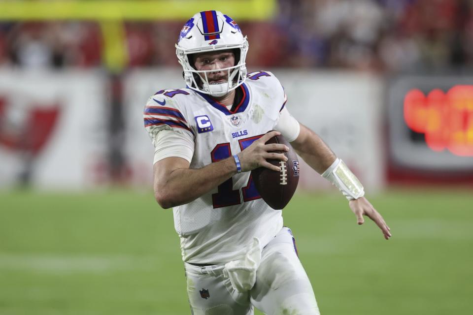 Buffalo Bills quarterback Josh Allen scrambles during a loss to the Tampa Bay Buccaneers on Sunday.