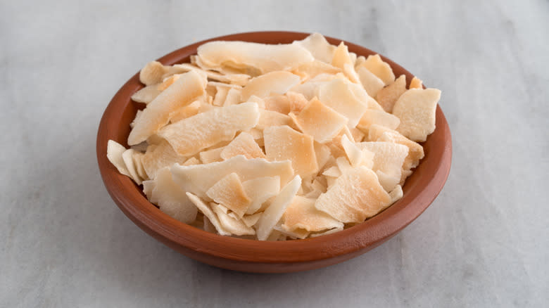 toasted coconut flakes in a bowl