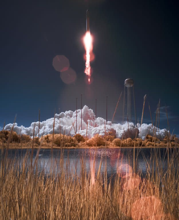 This photo courtesy of NASA shows the Orbital Sciences Corporation Antares rocket, with the Cygnus cargo spacecraft aboard, as it launches from Pad-0A of the Mid-Atlantic Regional Spaceport (MARS), September 18, 2013, NASA Wallops Flight Facility, Virginia