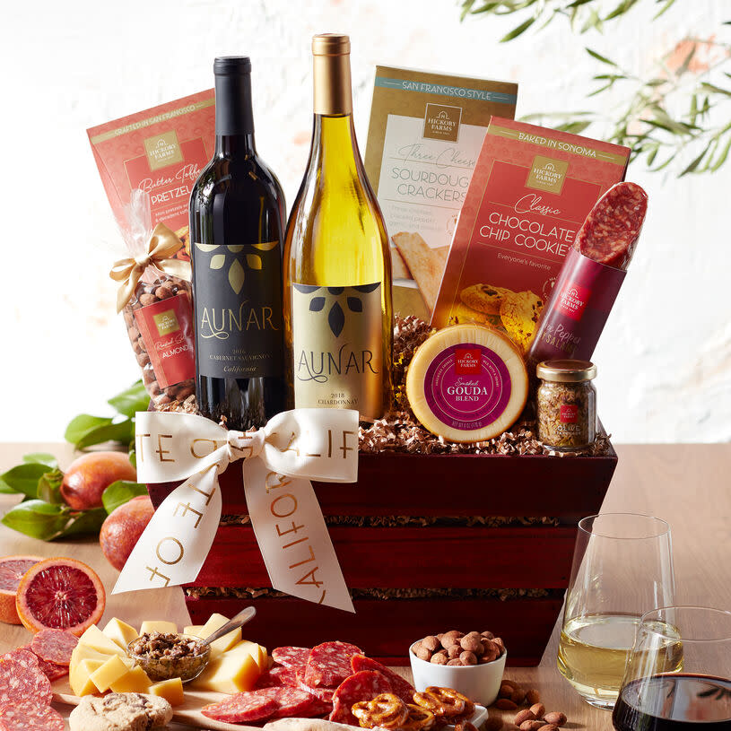 <p><a href="https://go.redirectingat.com?id=74968X1596630&url=https%3A%2F%2Fwww.hickoryfarms.com%2Fgift-baskets%2Fwine%2Fcalifornia-getaway-wine-gift-basket-007650.html&sref=https%3A%2F%2Fwww.delish.com%2Fholiday-recipes%2Fg2582%2Fwine-gifts%2F" rel="nofollow noopener" target="_blank" data-ylk="slk:Shop Now;elm:context_link;itc:0;sec:content-canvas" class="link ">Shop Now</a></p><p>Hickory Farms California Getaway Wine Gift Basket</p><p>Hickory Farms </p><p>$89.99</p><span class="copyright">Hickory Farms</span>