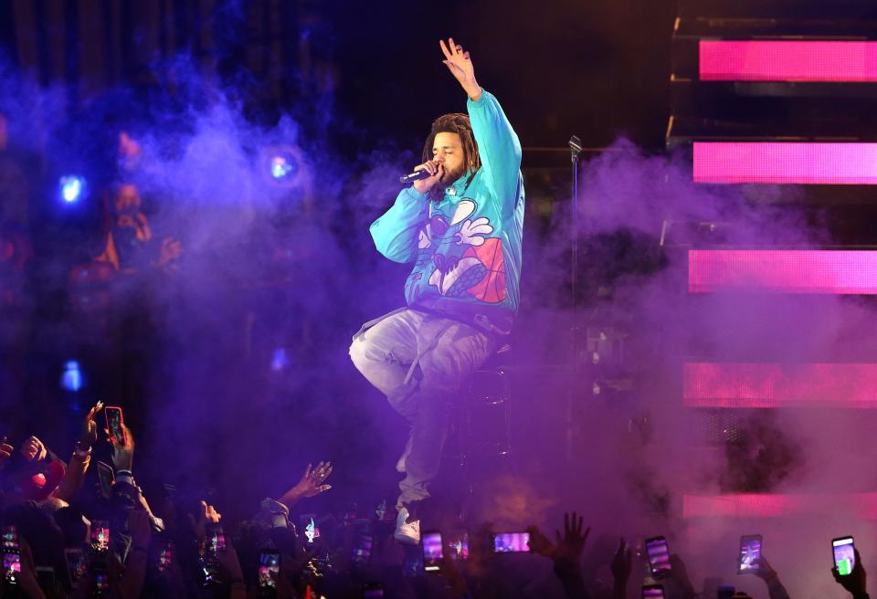 Recording artist J. Cole performs during the half-time show at the All-Star Game at Spectrum Center.