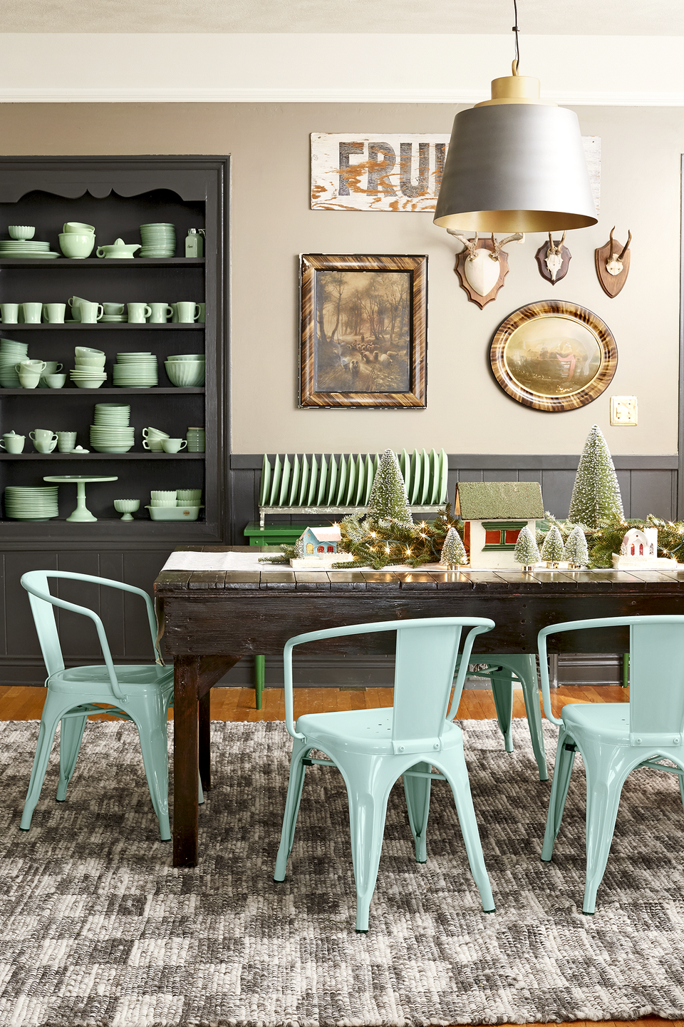 <p>An eclectic mix of collectibles, vintage treasures, and plenty of bottle brush trees in various shades of green add color to the top of the dining table in <a href="https://www.countryliving.com/home-design/house-tours/g4929/farmhouse-packed-christmas-decorating-ideas/" rel="nofollow noopener" target="_blank" data-ylk="slk:this Midwest farmhouse;elm:context_link;itc:0;sec:content-canvas" class="link ">this Midwest farmhouse</a>. </p><p><a class="link " href="https://www.amazon.com/Miniature-Christmas-Tabletop-Ornaments-Decoration/dp/B07SZNJCSB/ref=sr_1_16?tag=syn-yahoo-20&ascsubtag=%5Bartid%7C10050.g.644%5Bsrc%7Cyahoo-us" rel="nofollow noopener" target="_blank" data-ylk="slk:Shop Now;elm:context_link;itc:0;sec:content-canvas">Shop Now</a></p>