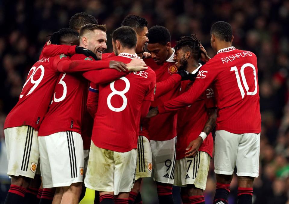 Manchester United players celebrate against Nottingham Forest (PA)