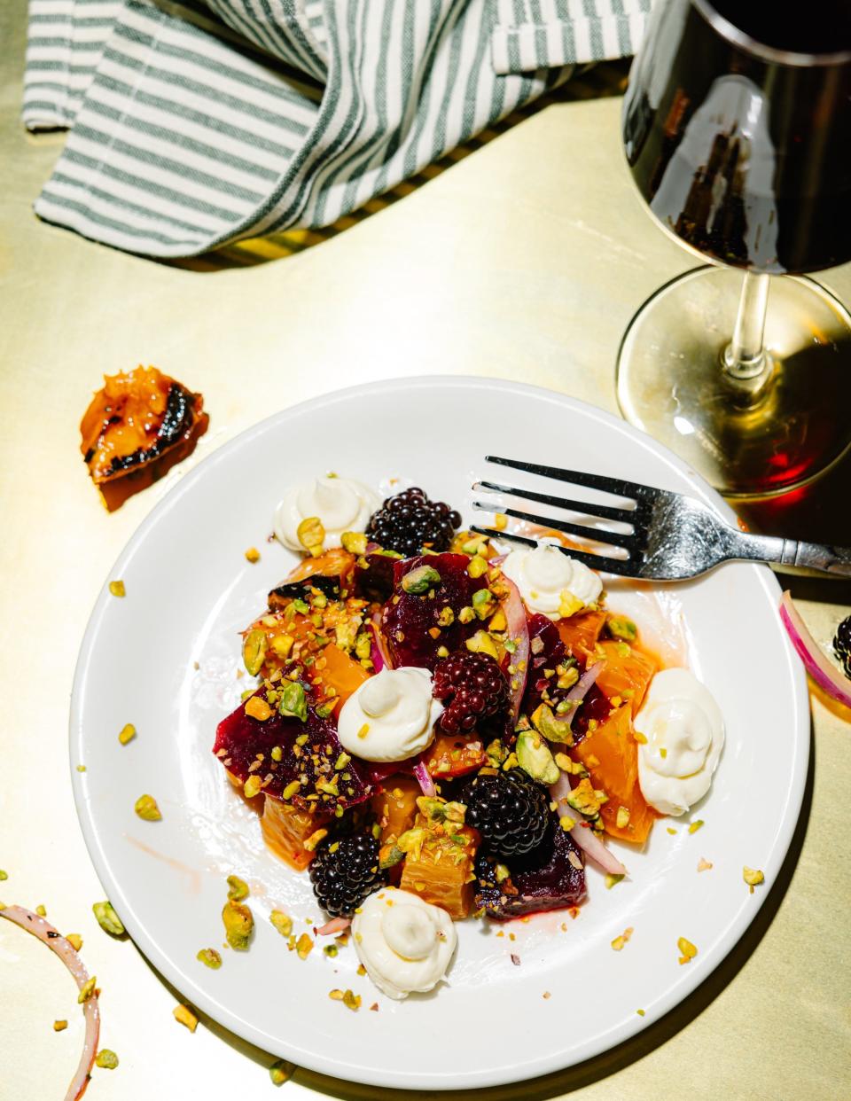 Salad with beets, grilled peaches, pickled blackberries, pistachio, Campari and taleggio for Olivero restaurant, scheduled to open in September in Wilmington, N.C.