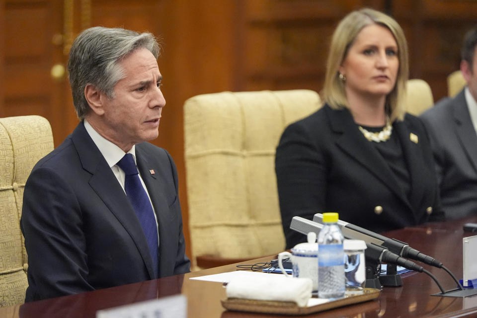 U.S. Secretary of State Antony Blinken, left, reacts during a meeting with China's Foreign Minister Wang Yi at the Diaoyutai State Guesthouse, Friday, April 26, 2024, in Beijing, China. (AP Photo/Mark Schiefelbein, Pool)