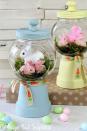<p>These faux gumball machines are made of overturned terra cotta pots and empty candy jars. Nestle a clump of artificial grass and a few plastic bunnies inside for a cute Easter vignette. </p><p><strong>Get the tutorial at <a href="http://www.averageinspired.com/2016/03/spring-bunny-gumball-machine-craft.html" rel="nofollow noopener" target="_blank" data-ylk="slk:Average But Inspired;elm:context_link;itc:0;sec:content-canvas" class="link ">Average But Inspired</a>.</strong> </p>