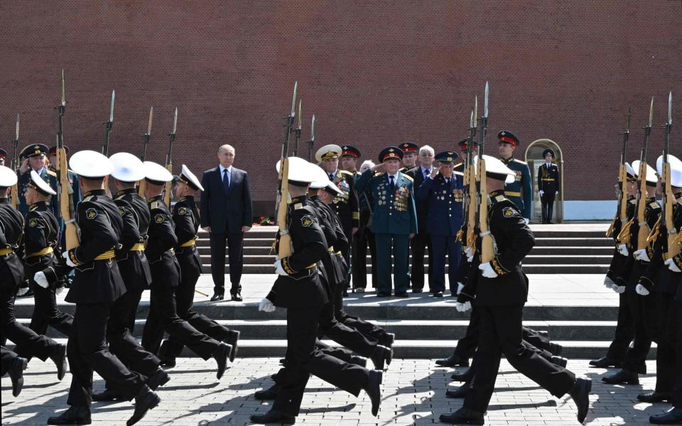 Putin attends the flower-laying ceremony at the Tomb of the Unknown Soldier - ALEXEY NIKOLSKY/Sputnik/AFP via Getty Images