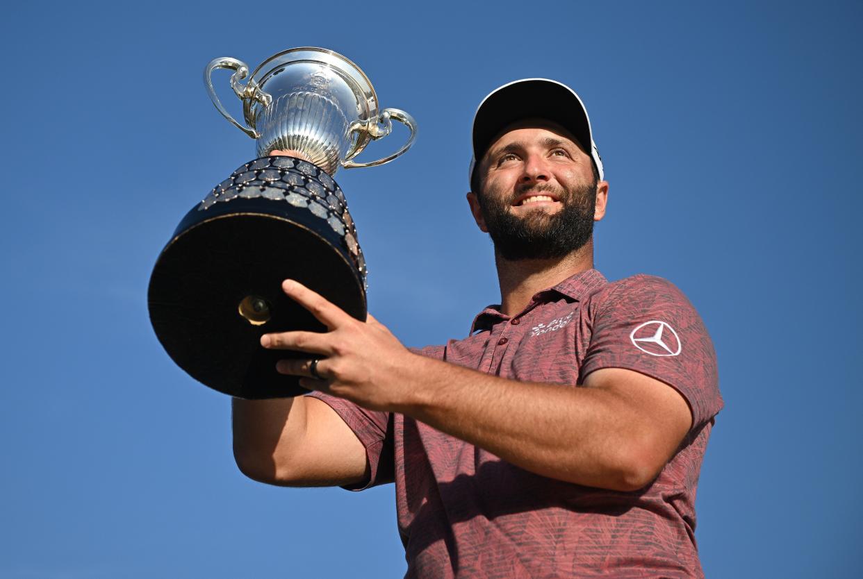 Jon Rahm holds the trophy after winning the 2022 acciona Open de Espana at Club de Campo Villa de Madrid in Spain. Photo by Stuart Franklin/Getty Images