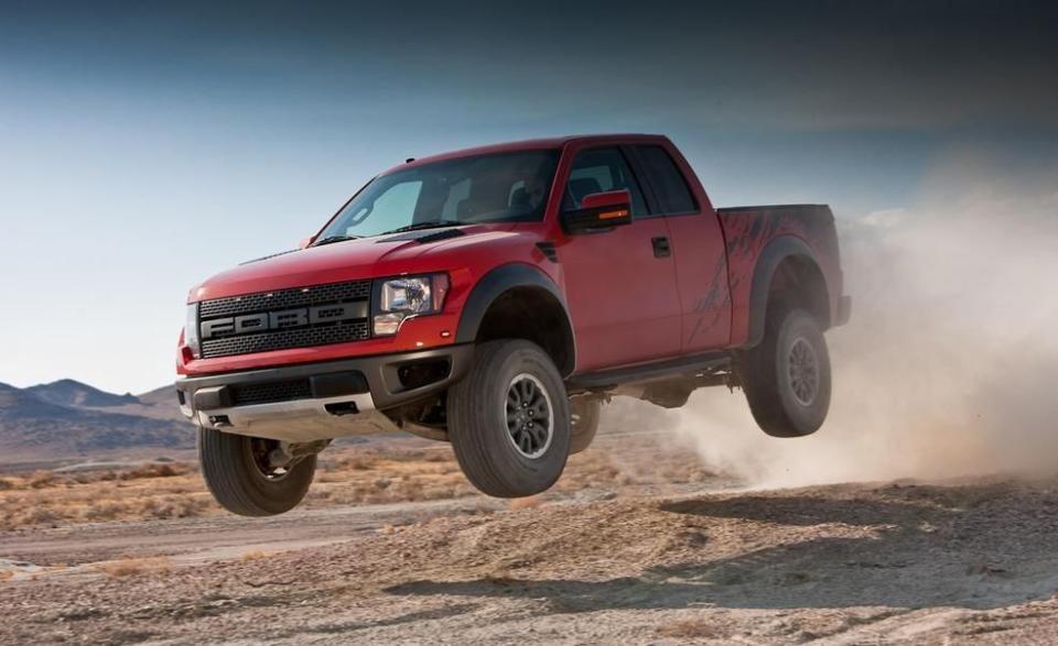 <p>The <a href="https://www.caranddriver.com/reviews/a16578894/2010-ford-f-150-svt-raptor-review/" rel="nofollow noopener" target="_blank" data-ylk="slk:2010 Ford F-150 SVT Raptor;elm:context_link;itc:0;sec:content-canvas" class="link ">2010 Ford F-150 SVT Raptor</a> puts the entire truck world on notice. Unlike previous SVT projects, the Raptor's primary magic lies not under the hood but in its rugged, off-road-ready long-travel suspension. Consisting of beefy cast-aluminum lower control arms up front and Fox Shox Racing dampers at all four corners, the suspension boasts 11.2 inches of travel in front and 12.1 in the rear—stock, right off the showroom floor. Early versions ship with a 320-hp version of Ford's SOHC 5.4-liter V-8. A much more appropriate 411-hp 6.2-liter V-8 powers later Raptors.</p>