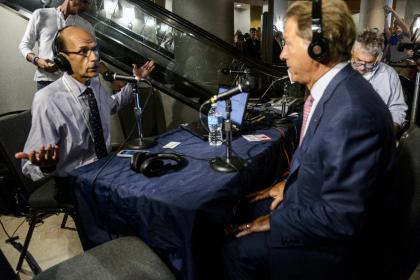 Alabama Coach Nick Saban, right, visits Paul Finebaum's, left, show as his last stop at SEC Media Days, Thursday, July 17, 2014, at the Hyatt Regency in Hoover, Ala. (AP Photo/AL.com, Vasha Hunt)