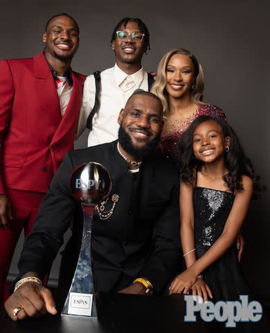 <p>Ben Trivett/Shutterstock for PEOPLE</p> Lebron James and family