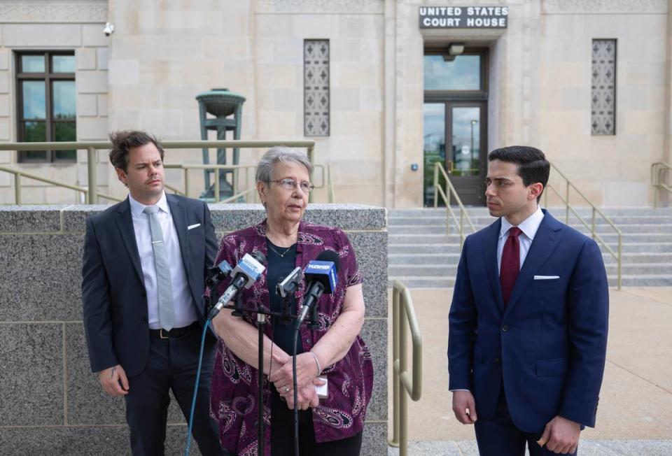 Former Marion City Council member Ruth Herbel speaks outside of the Federal Courthouse in downtown Wichita on Wednesday after she and her attorneys filed a federal lawsuit against the city of Marion and several current and former officials over a police raid of Herbel’s home and the newsroom of the Marion County Record last August.