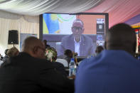 Rwanda's President Paul Kagame speaks remotely via video call to the Third Inter-Congolese Consultations of the Nairobi Peace Process, the political track, Nairobi III, at a hotel in Nairobi, Kenya Monday, Nov. 28, 2022. The East African Community (EAC) led summit aims to find solutions to the ongoing armed conflict in Eastern Congo. (AP Photo/Brian Inganga)