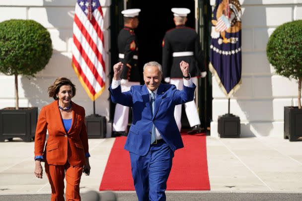 PHOTO: House Speaker Nancy Pelosi and Senate Majority Leader Chuck Schumer arrive for a celebration of the enactment of the 'Inflation Reduction Act of 2022,' which President Biden signed into law in August, at the White House, Sept. 13, 2022.  (Kevin Lamarque/Reuters)