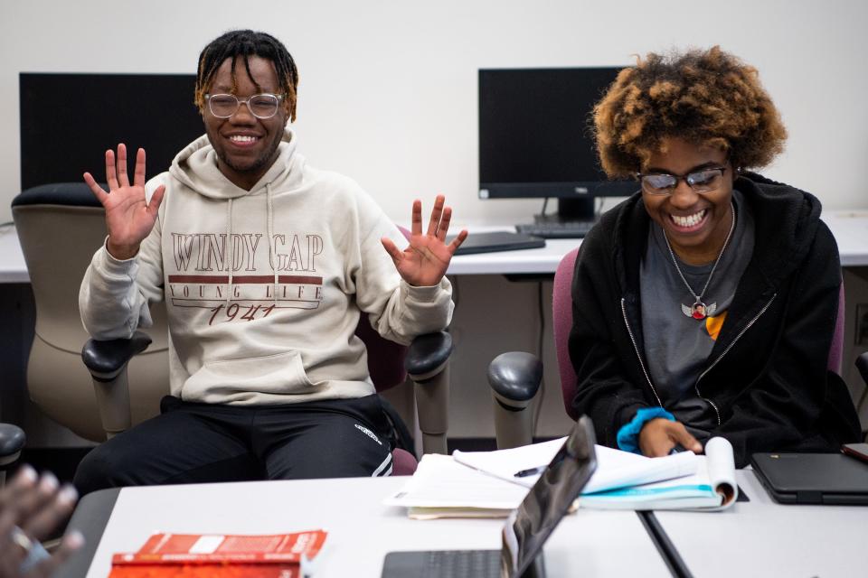 Austin-East Magnet High students Marcus Mallory and Aeriel Holt share a laugh as they participate in the University of Tennessee's Project Excellence program last month. Students leave the program with up to five undergraduate credit hours in educational leadership and policy studies.