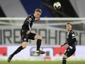 Bielefeld's defender Amos Pieper in action during the match against Union, during their German Bundesliga soccer match at Sch'co Arena in Bielefeld, Germany, Sunday March 7, 2021. (Friso Gentsch/dpa via AP)