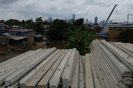 Concrete piles that were built to prevent flooding are seen at the Ciliwung river bank at Jatinegara district in Jakarta, Indonesia, December 29, 2016. Picture taken December 29, 2016. REUTERS/Beawiharta