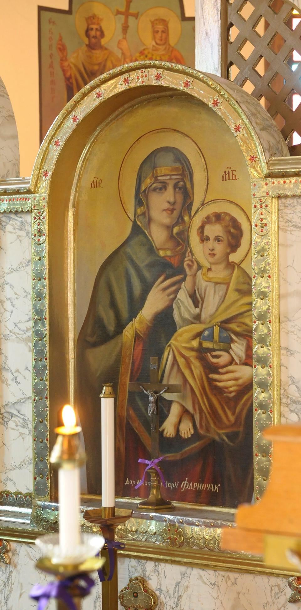 A painting of the Madonna and Child is in the sanctuary of the St. John the Baptist Ukrainian Catholic Church, along with other icons and artworks of faith in 2014.