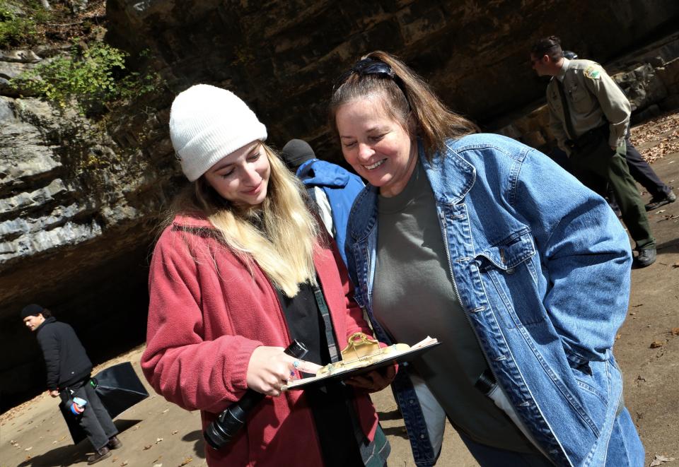 Arch Media's Dunbar Cave project assistant producer Sydney Harris, left, collaborating with  Amanda Blount, right, of Friends of Dunbar Cave