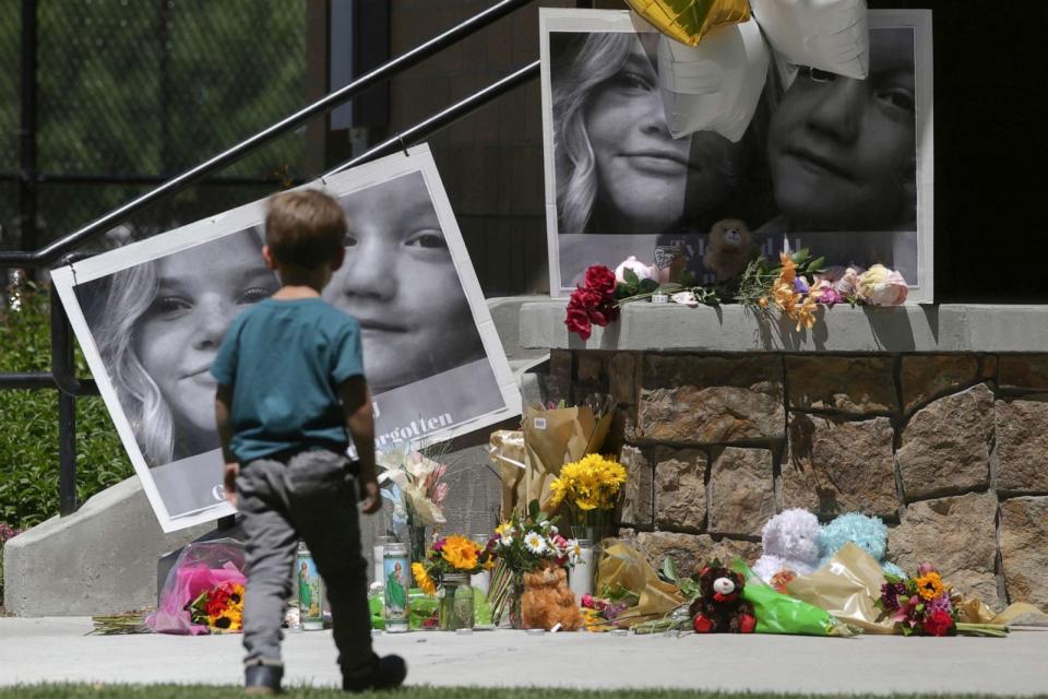 PHOTO: A boy looks at a memorial for Tylee Ryan, 17, and Joshua 'JJ' Vallow, 7, at Porter Park in Rexburg, Idaho, June 11, 2020. (The Idaho Post-Register via AP, File)