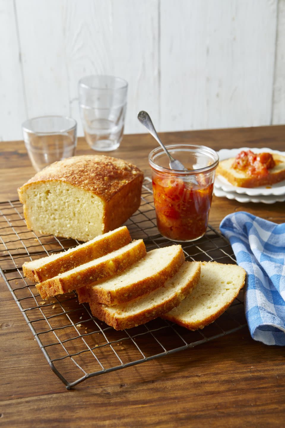 <p>For an extra treat, try this savory bread topped with a bit of spicy <a href="https://www.countryliving.com/food-drinks/recipes/a1652/tomato-jam-3768/" rel="nofollow noopener" target="_blank" data-ylk="slk:tomato jam;elm:context_link;itc:0;sec:content-canvas" class="link ">tomato jam</a>.</p><p><strong><a href="https://www.countryliving.com/food-drinks/a34946658/parmesan-and-garlic-quick-bread-recipe/" rel="nofollow noopener" target="_blank" data-ylk="slk:Get the recipe;elm:context_link;itc:0;sec:content-canvas" class="link ">Get the recipe</a>.</strong></p><p><a class="link " href="https://www.amazon.com/USA-Pan-1140LF-Bakeware-Aluminized/dp/B0029JQEIC/?tag=syn-yahoo-20&ascsubtag=%5Bartid%7C10050.g.35246097%5Bsrc%7Cyahoo-us" rel="nofollow noopener" target="_blank" data-ylk="slk:SHOP LOAF PANS;elm:context_link;itc:0;sec:content-canvas">SHOP LOAF PANS</a><br></p>