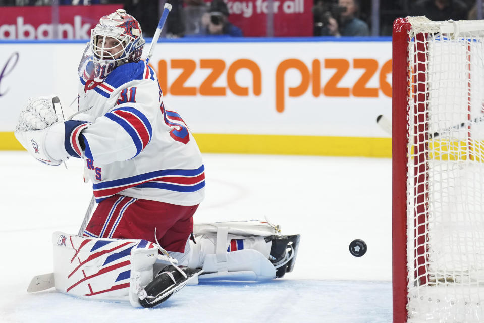 New York Rangers goaltender Igor Shesterkin looks back at a goal by Toronto Maple Leafs forward Auston Matthews during the second period of an NHL hockey game Tuesday, Dec. 19, 2023, in Toronto. (Nathan Denette/The Canadian Press via AP)