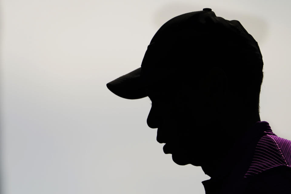 Tiger Woods walks alone the fourth fairway during the third round of the Masters golf tournament Saturday, Nov. 14, 2020, in Augusta, Ga. (AP Photo/David J. Phillip)