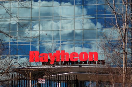 FILE PHOTO: A sign marks the Raytheon offices in Woburn
