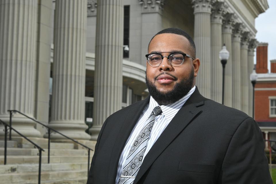 Marcus Yuille is Erie County's new diversity, equity and inclusion officer. Yuille, 29, is shown outside the Erie County Courthouse on Dec. 21.