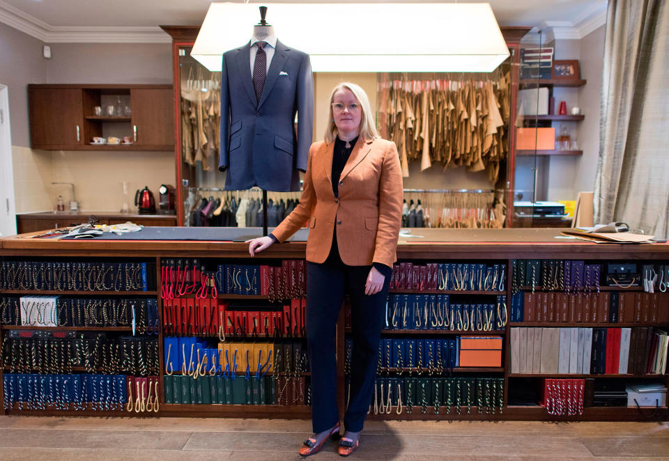 <p>Master tailor Kathryn Sargent poses for a portrait in her shop in central London on February 23, 2018. (Photo: Justin Tallis/AFP/Getty Images) </p>