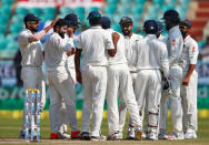 Cricket - India v England - Second Test cricket match - Dr. Y.S. Rajasekhara Reddy ACA-VDCA Cricket Stadium, Visakhapatnam, India - 21/11/16. India's Ravindra Jadeja (2nd L) celebrates with team mates the dismissal of England's Moeen Ali. REUTERS/Danish Siddiqui