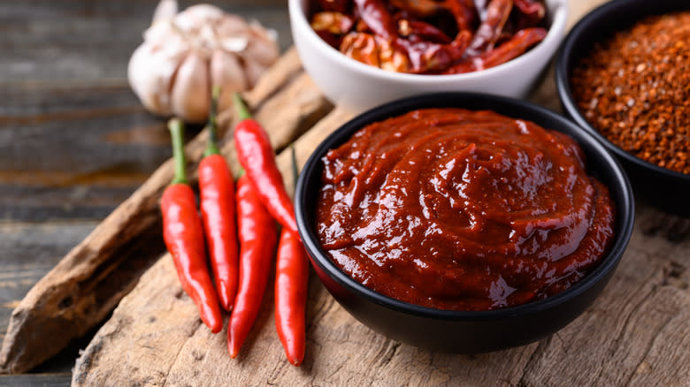 bowl of gochujang with chillies