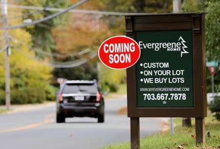 A sign advertising a new home is pictured in Vienna, Virginia, outside of Washington, October 20, 2014. REUTERS/Larry Downing