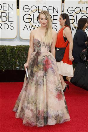 Actress Kaley Cuoco arrives at the 71st annual Golden Globe Awards in Beverly Hills, California January 12, 2014. REUTERS/Danny Moloshok